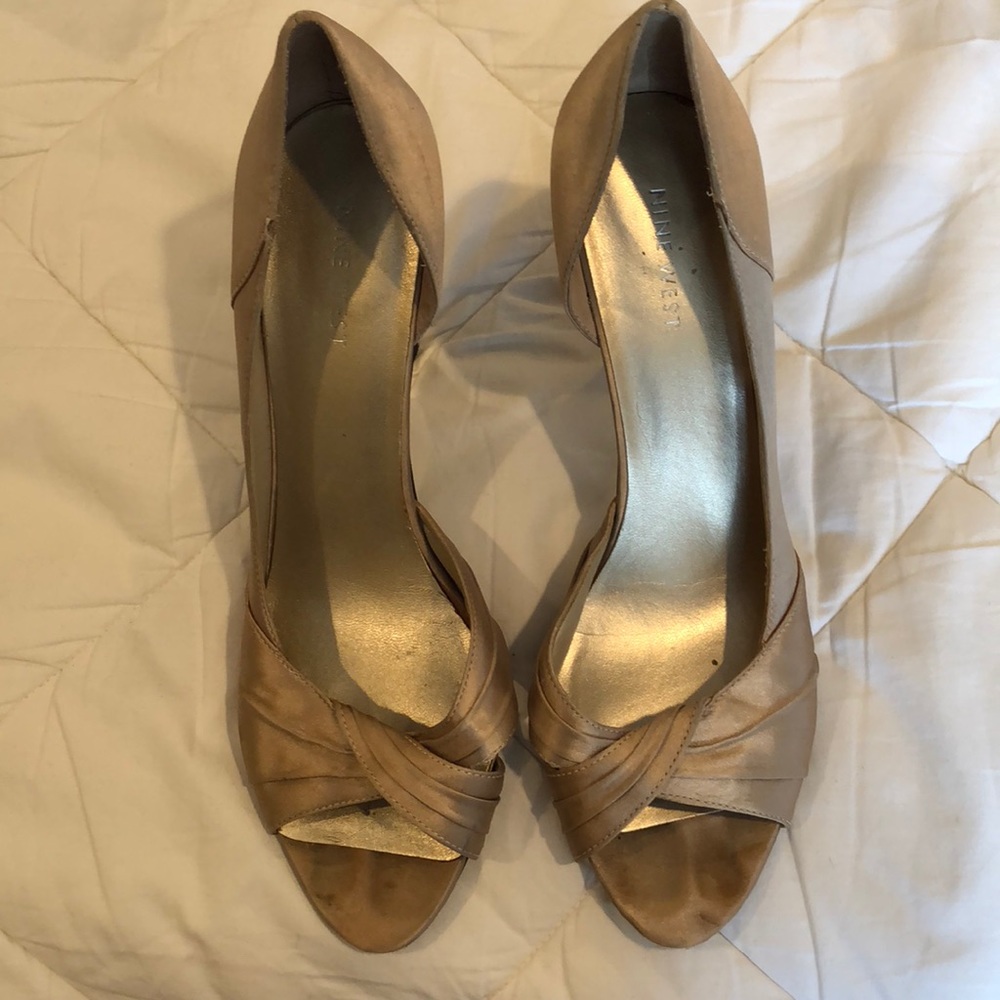 Gently worn champagne colored Nine West pumps